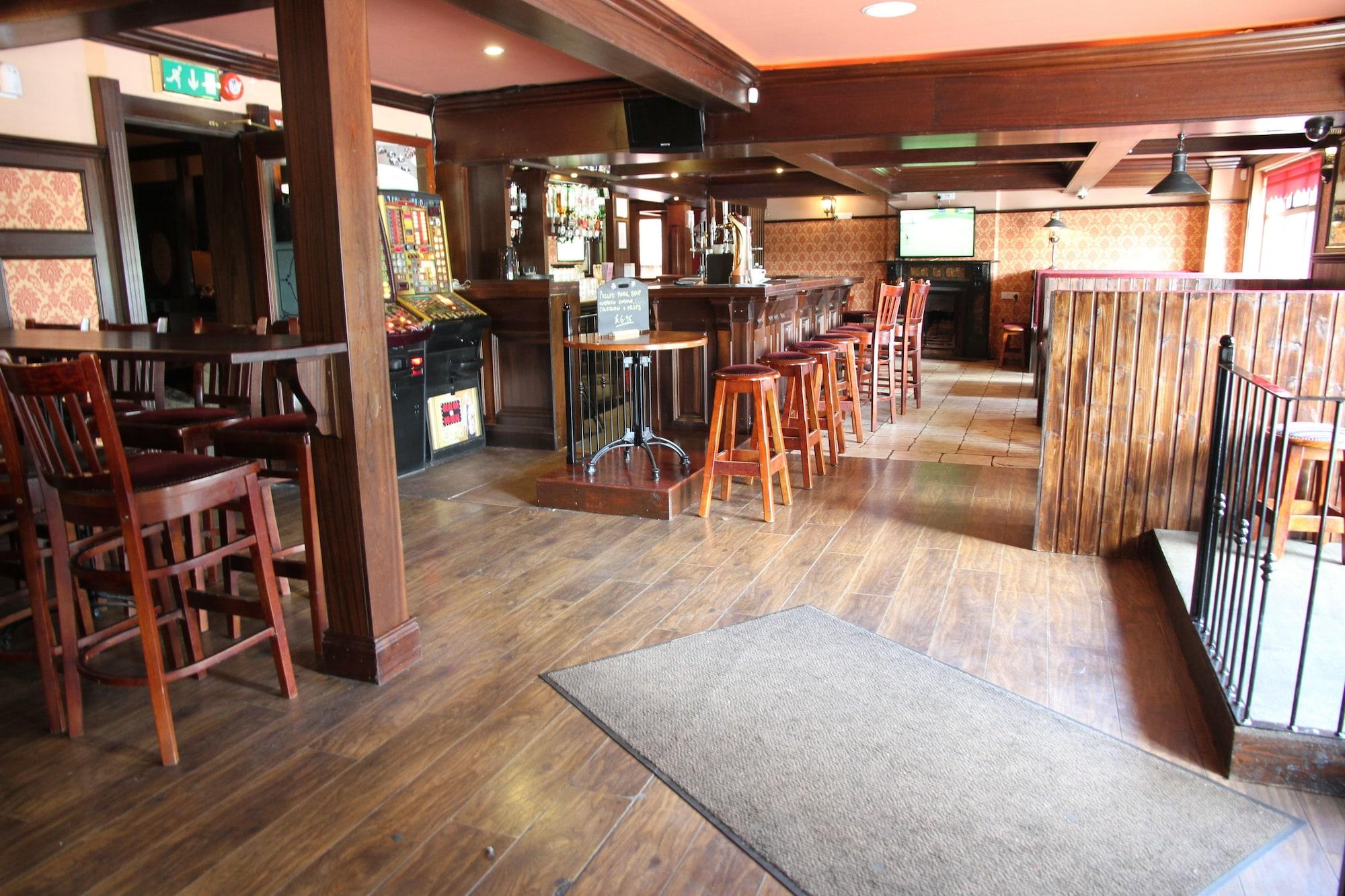 Bar/Salón 5 Corners Guest Inn