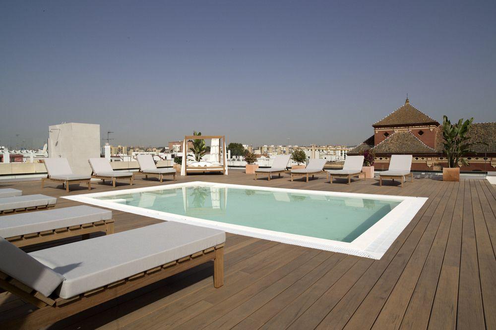 Vista da piscina Hotel Zenit Sevilla