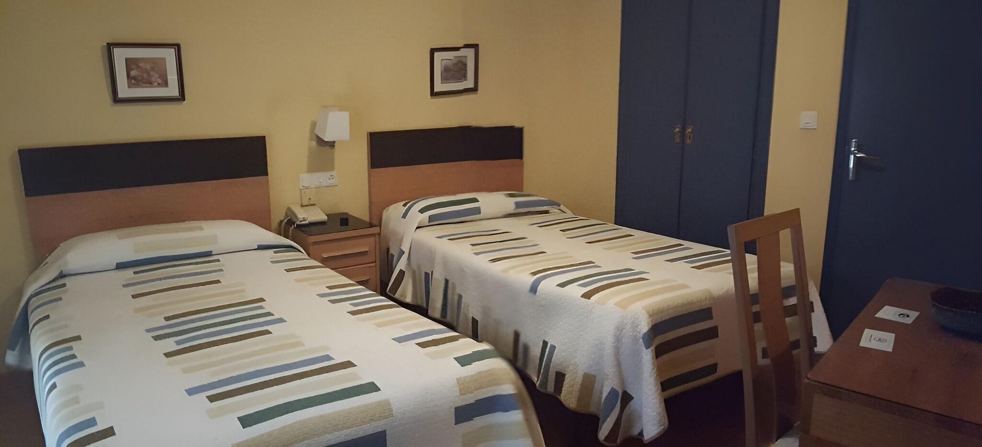 Habitación Hostal Guzman El Bueno by gaiarooms