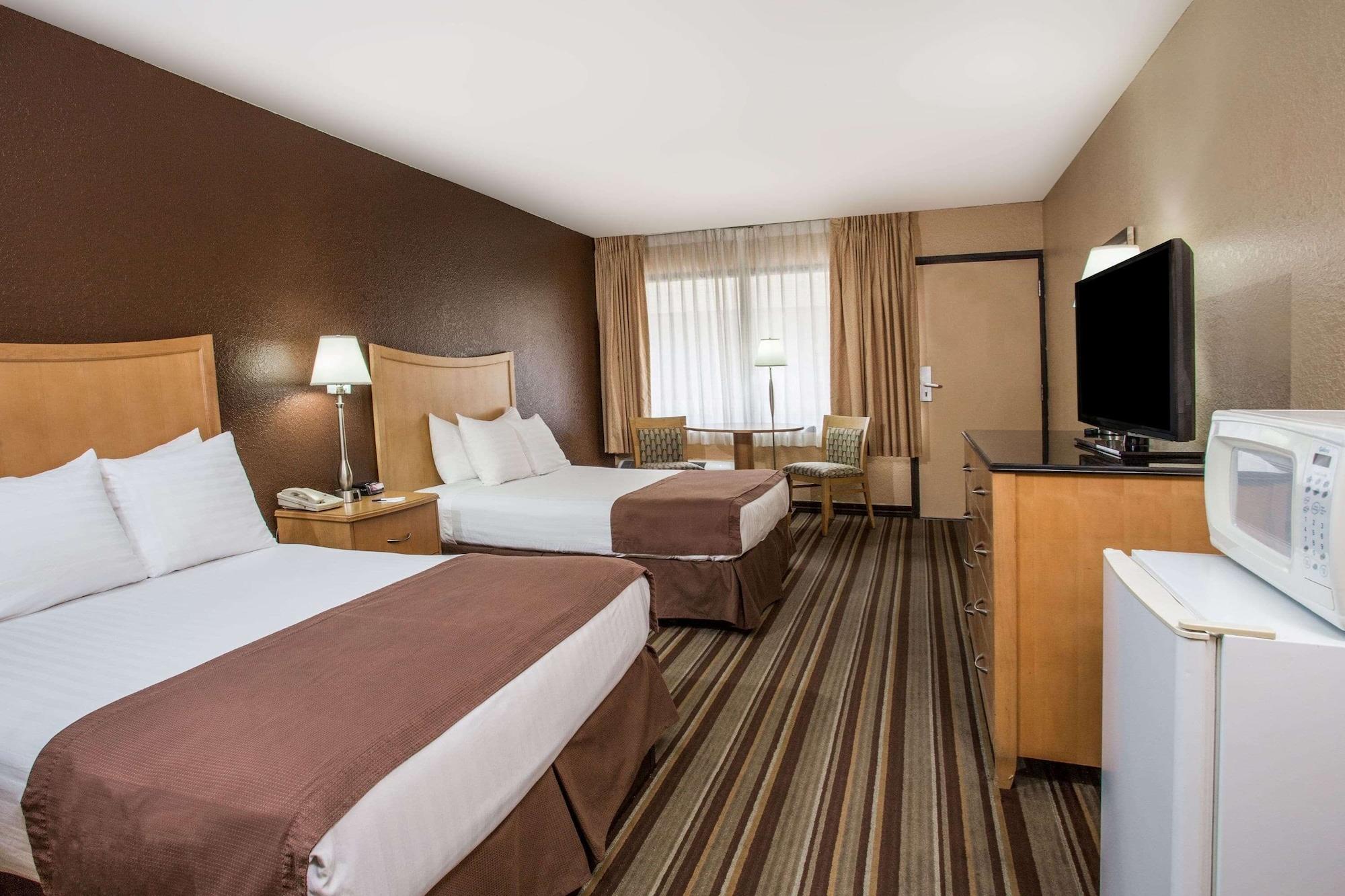 Habitación Travelodge by Wyndham Deltona