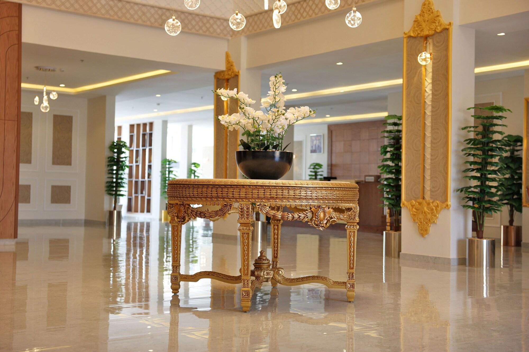 Vista do lobby alzuwain hotil