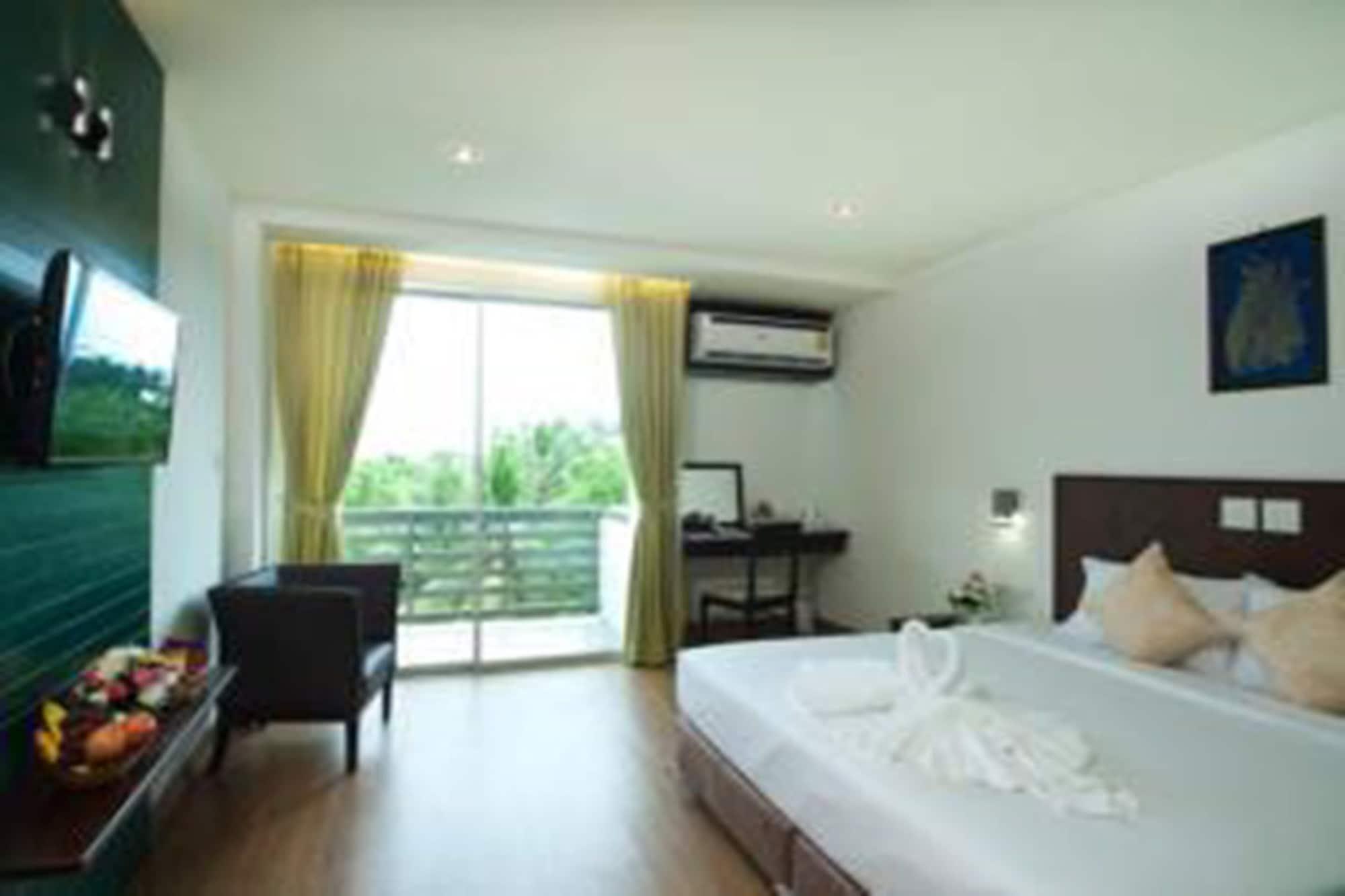 Habitación The Flora May Resort