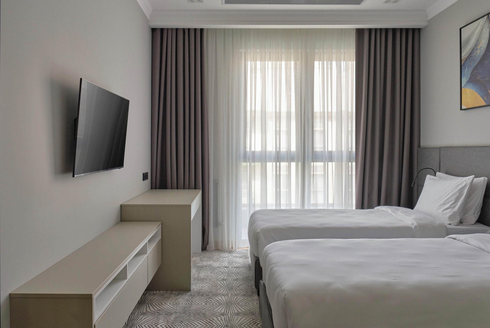 Habitación STYLO Residences & Suites