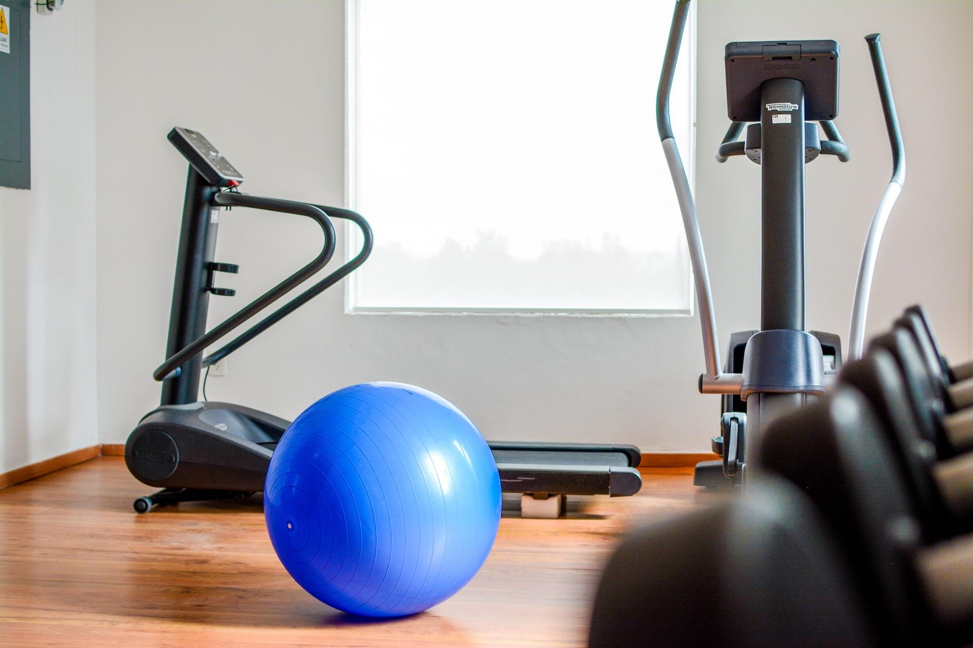 Gimnasio Stain Loft & Suites