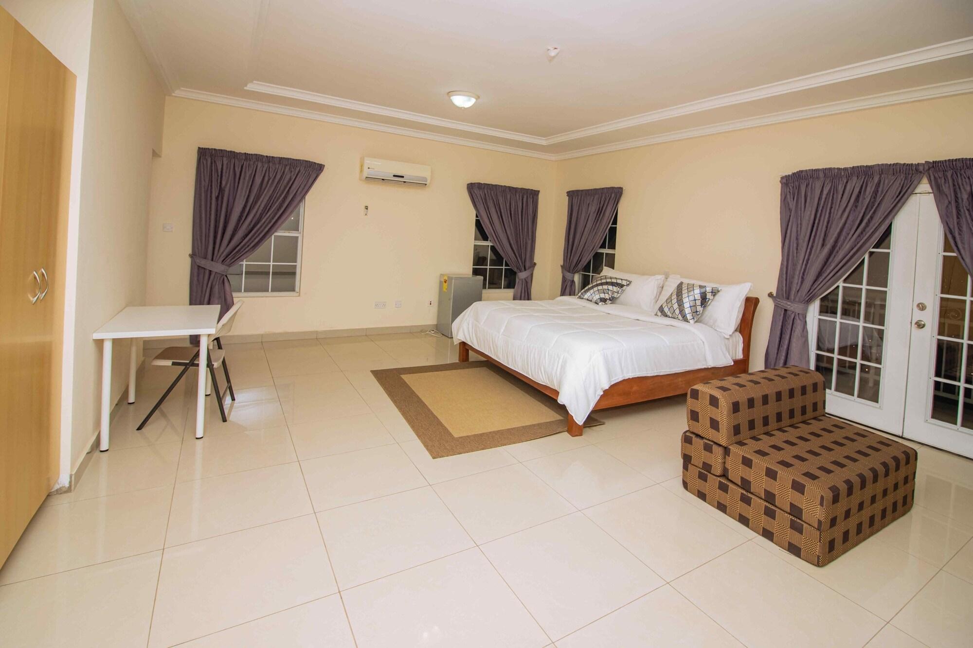 Habitación Brown Hills Residences