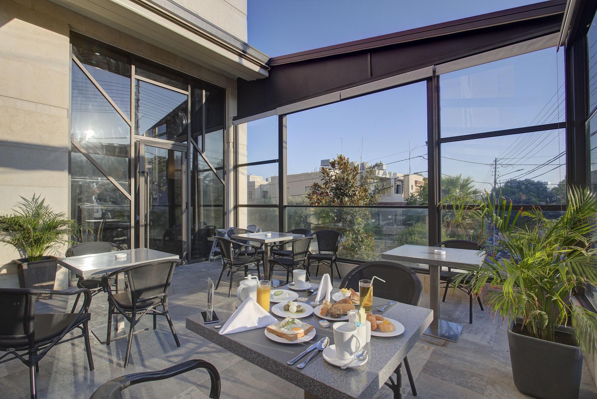 Restaurant The House Boutique Suites