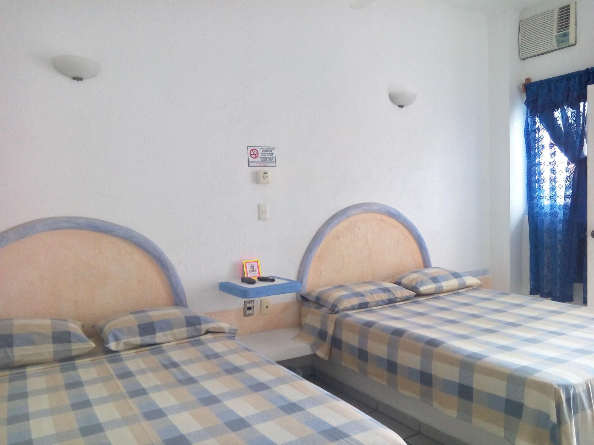 Habitación Hotel Sarabi Barra de Navidad