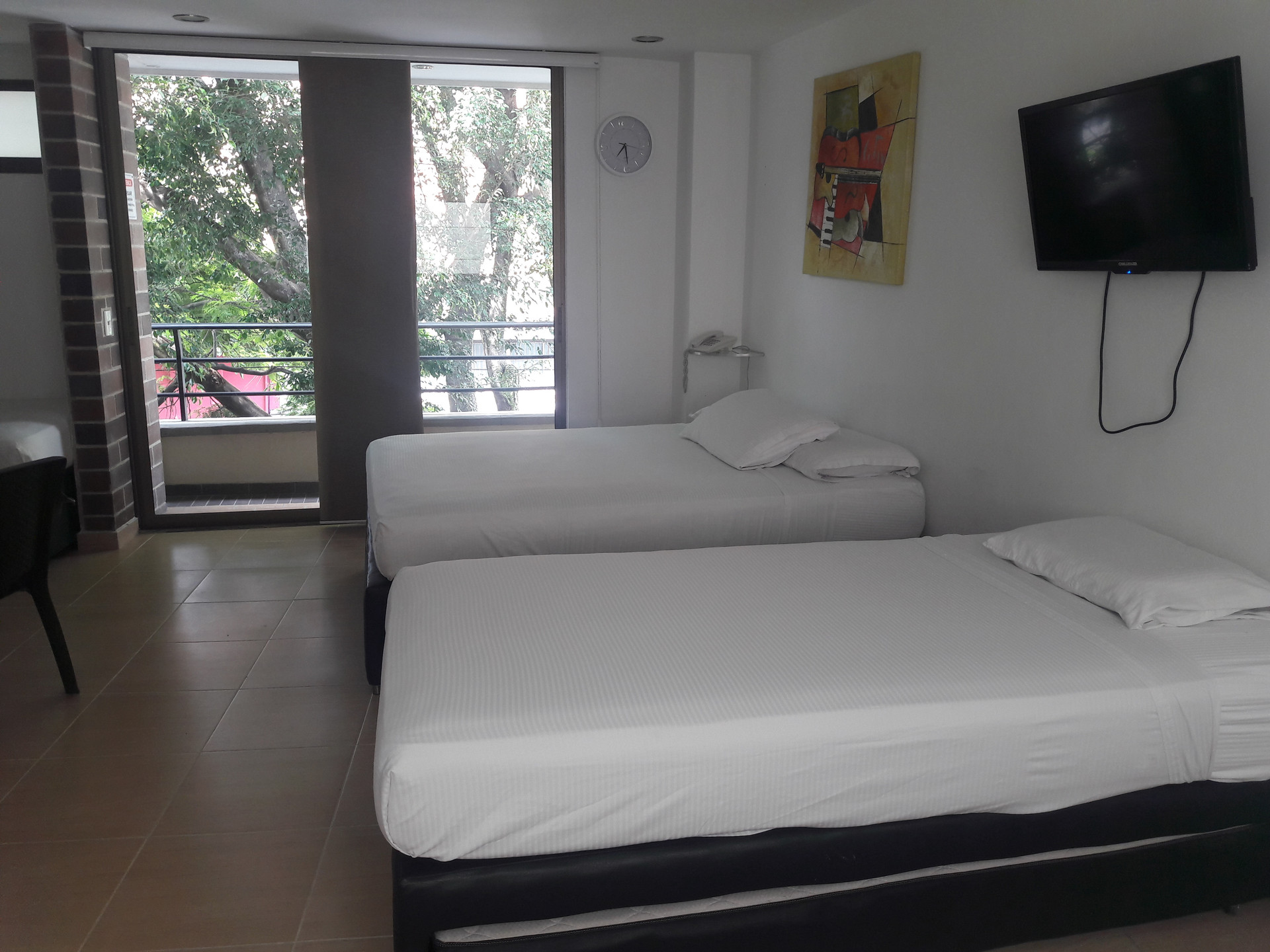 Habitación Apartahotel Montes sede de la Av 70