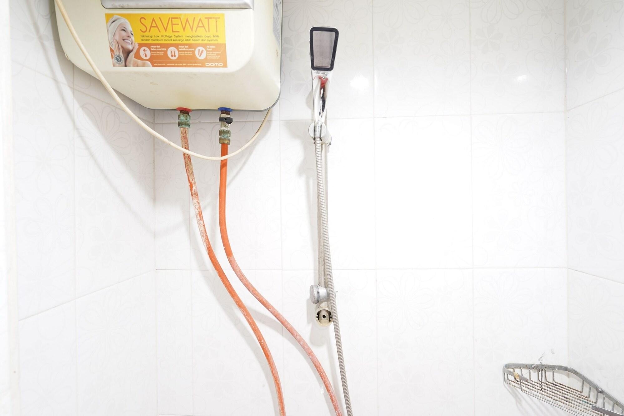Equipamiento de Habitación OYO 93547 Metro Suites Apartment By Barbie Homestay