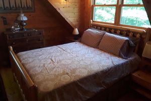 Alquiler Vacacional - A beautiful log cabin home on Lake Huron, amazing lake views, hot tub, game room