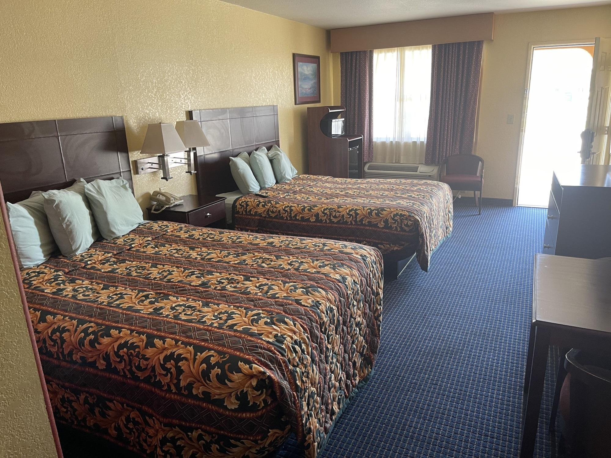 Habitación Gun Barrel Executive Inn