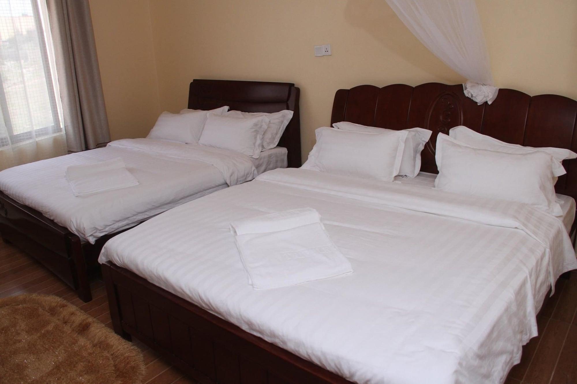 Habitación TrippleO's Hotel