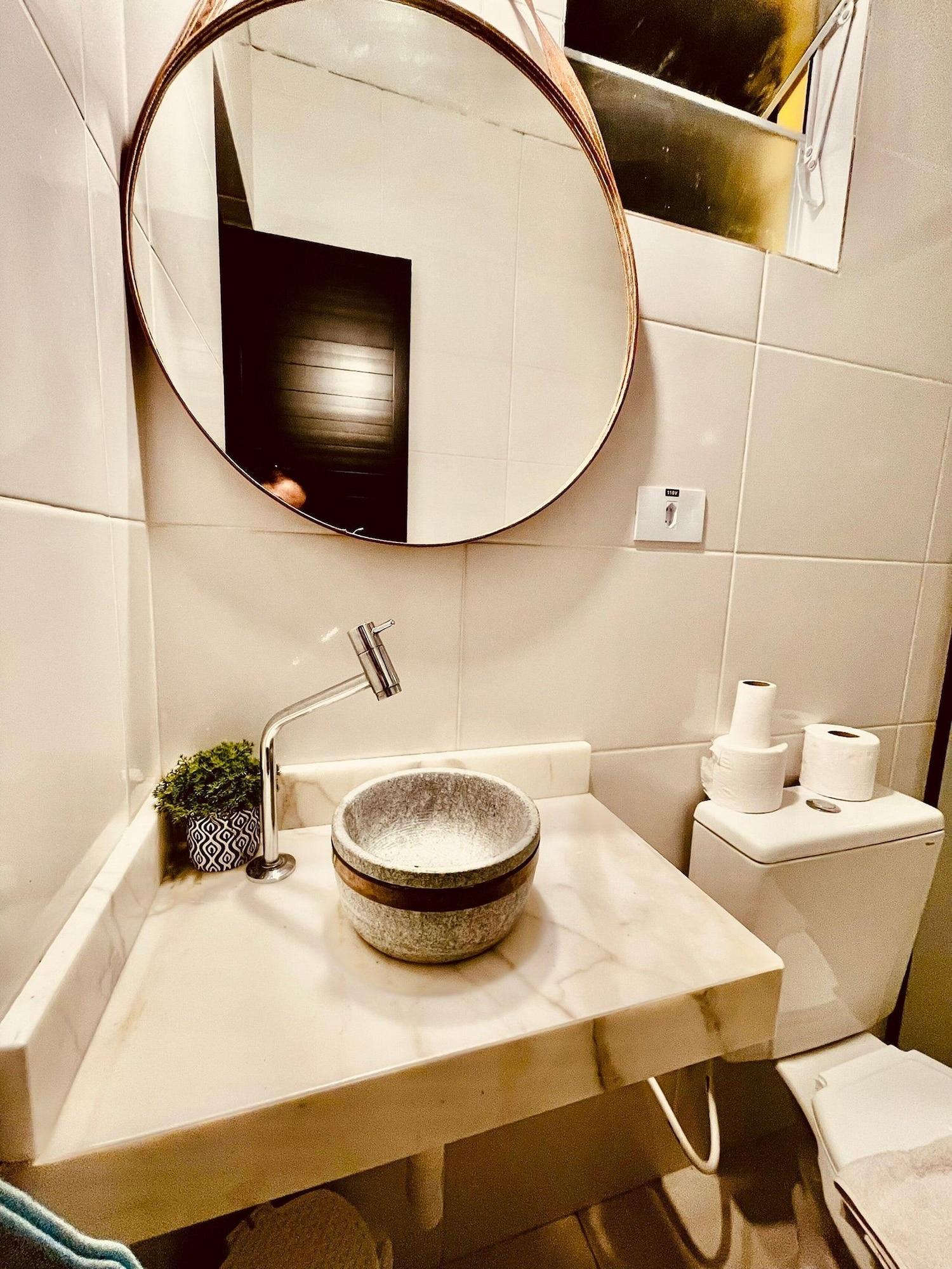 Comodidades do quarto Casinha Amarela