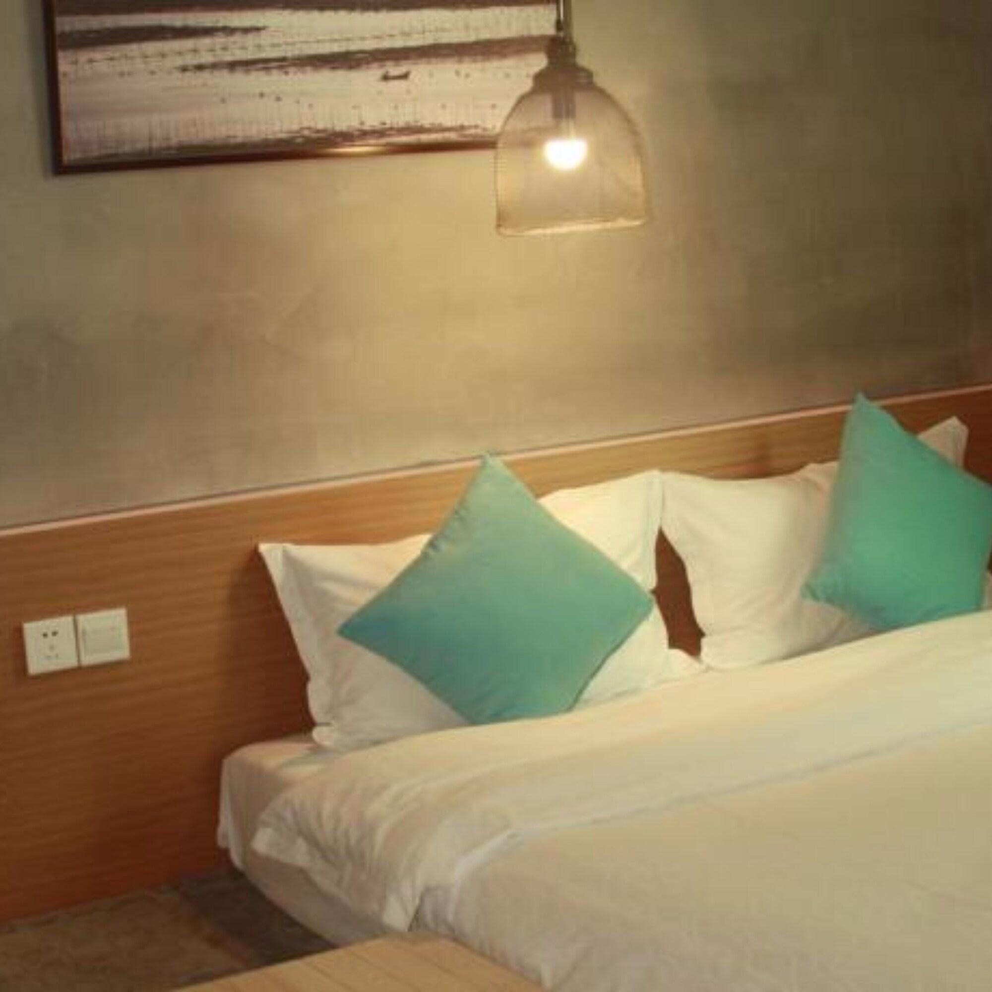 Varios Bushe Cuoguo Inn