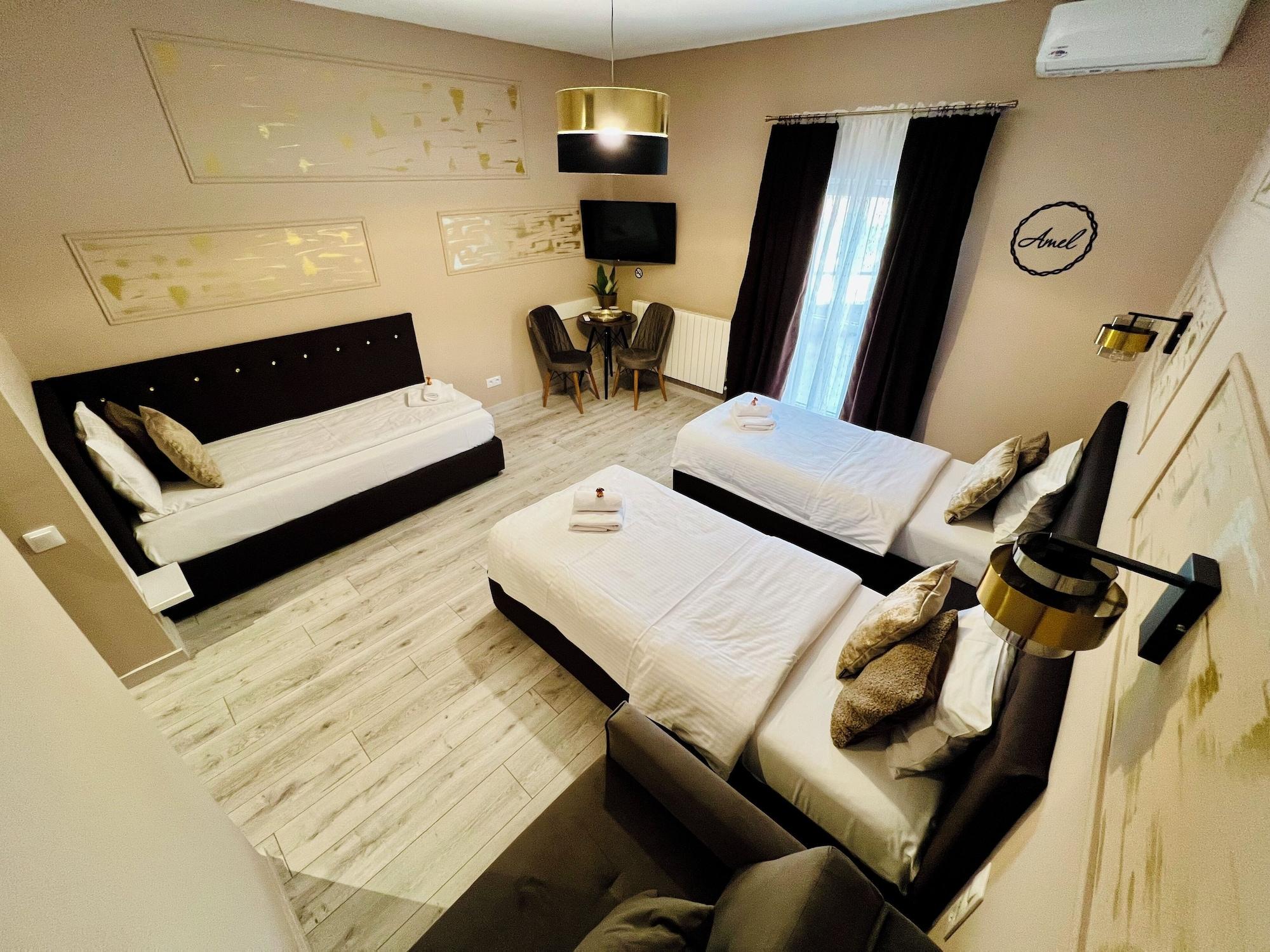 Habitación AMEL ROOMS