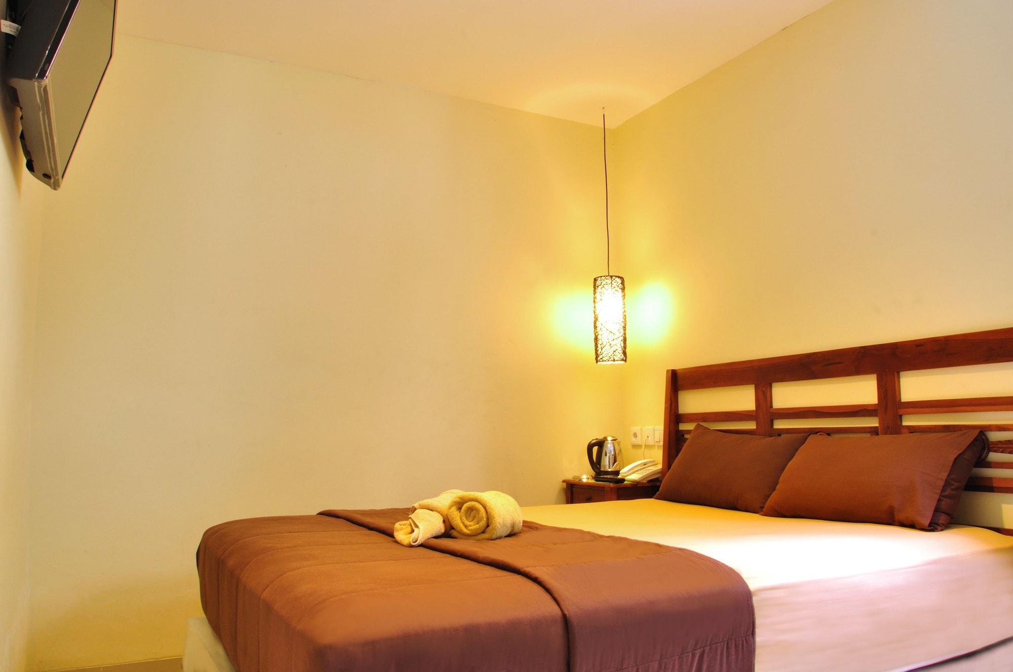 Varios Kuta Sari House