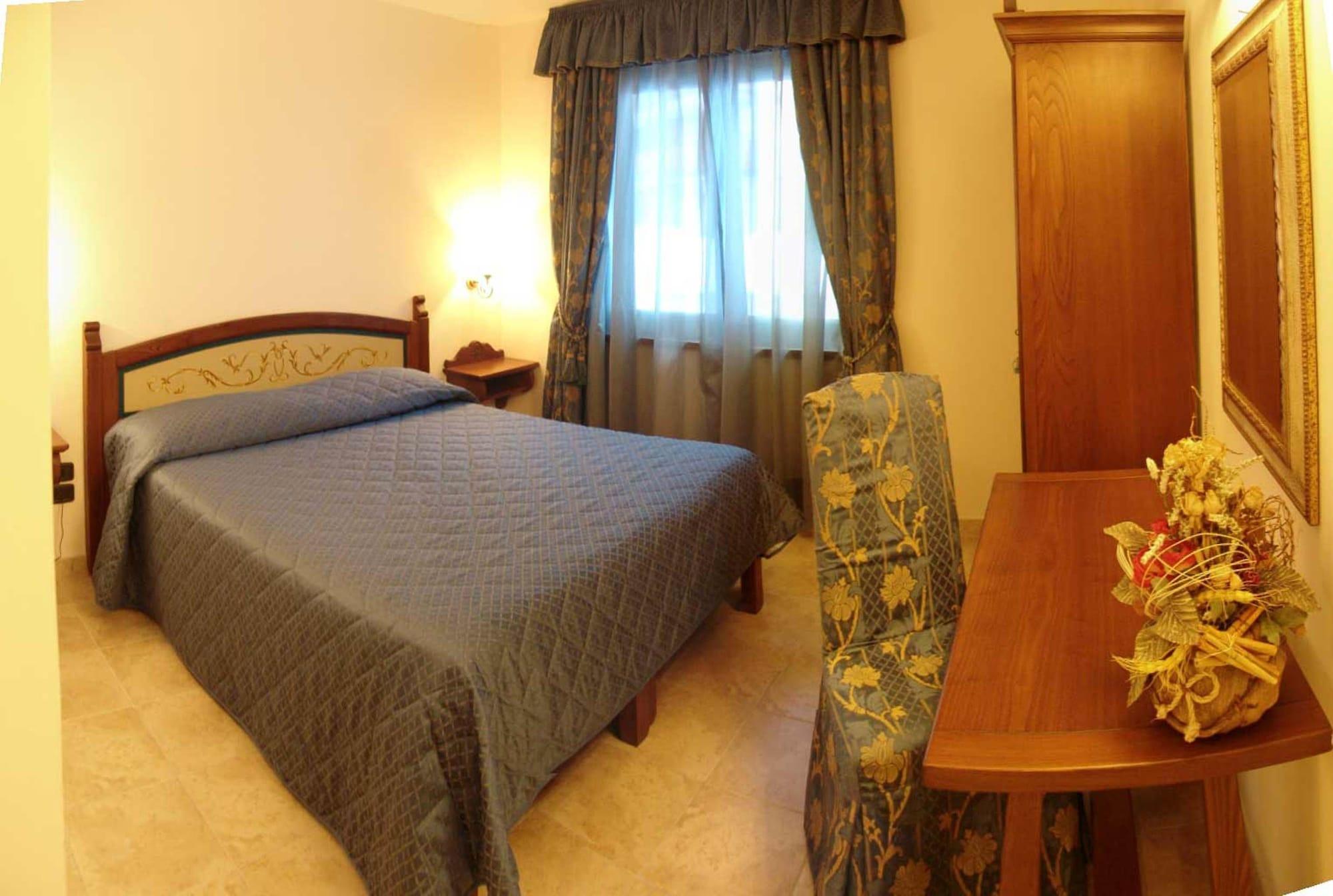 Habitación Hotel LuSi