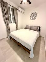 Alquiler Vacacional - Casa Marty. Spacious 4-bedroom house in pleasant Aguadilla with cool AC breeze.