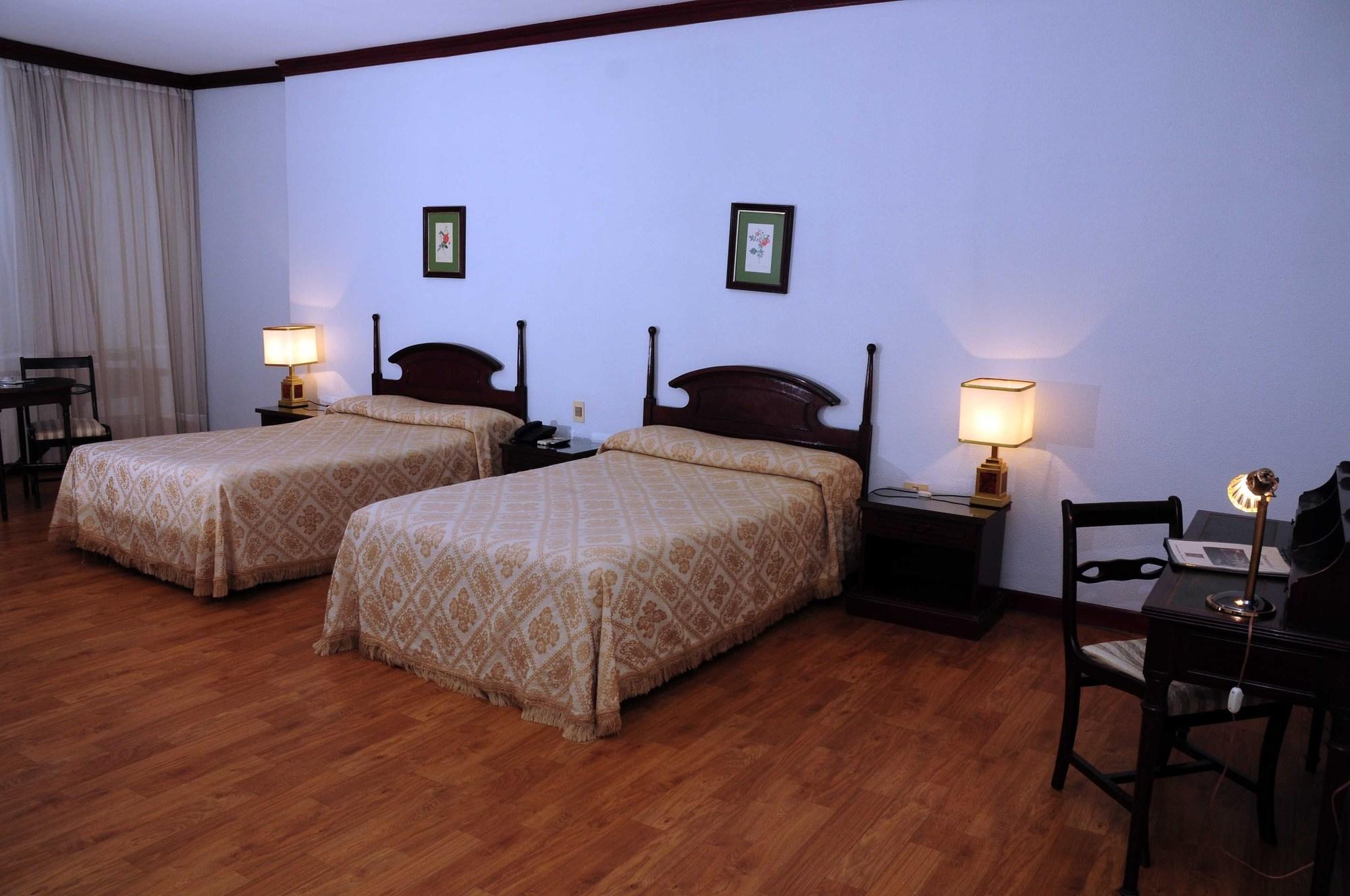 Habitación Hotel Excelsior Inn