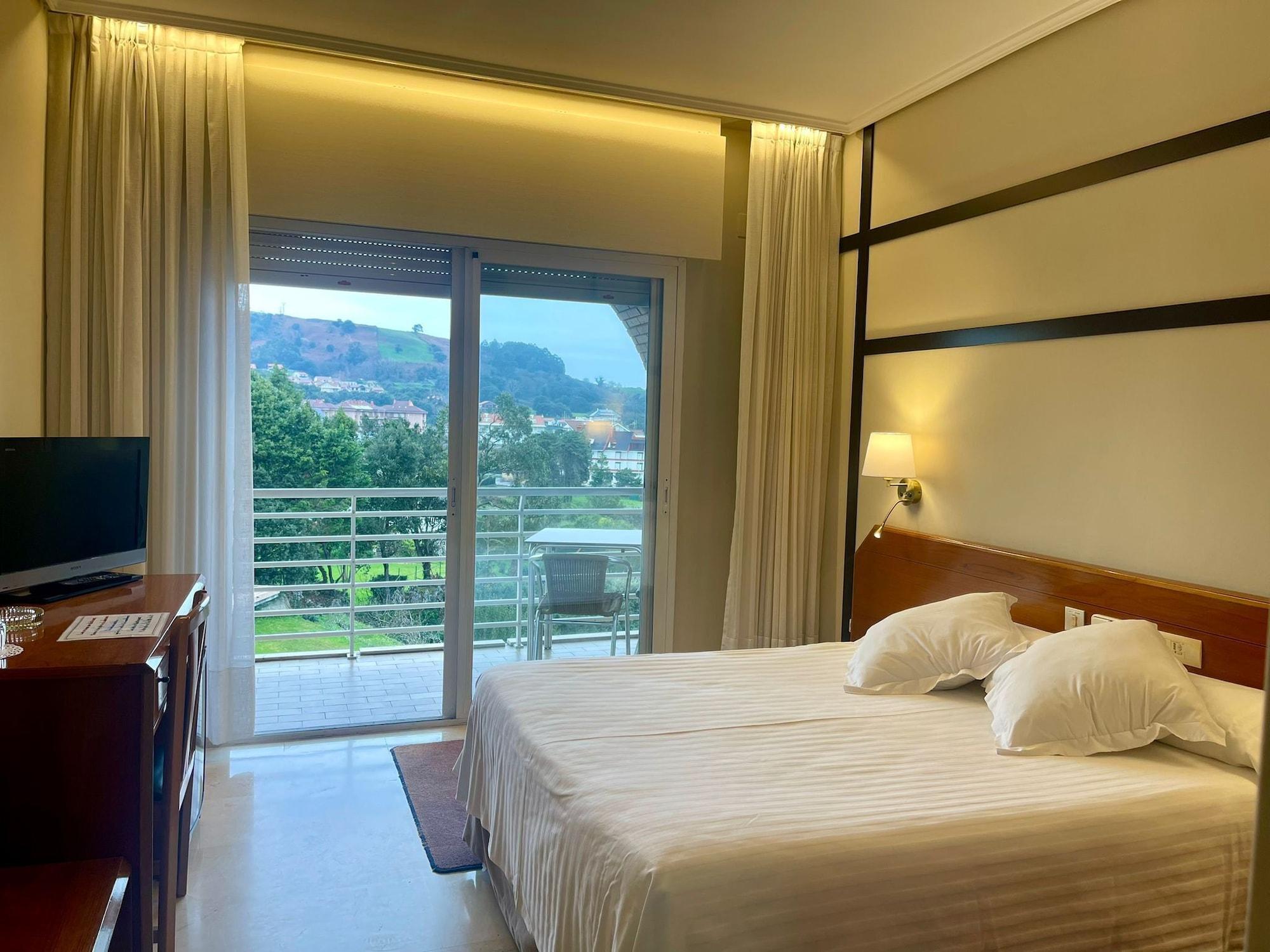 Habitación Hotel Olimpo