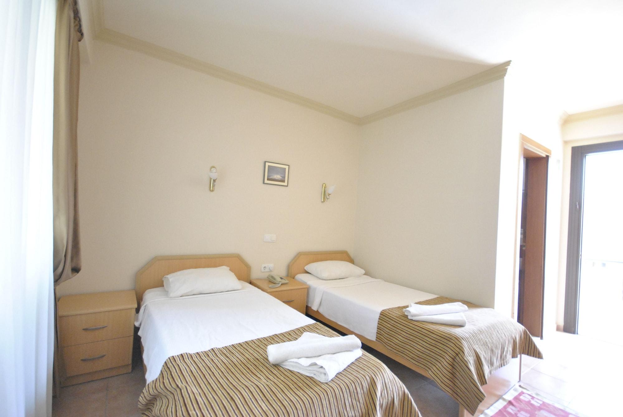 Habitación Moms Hotel