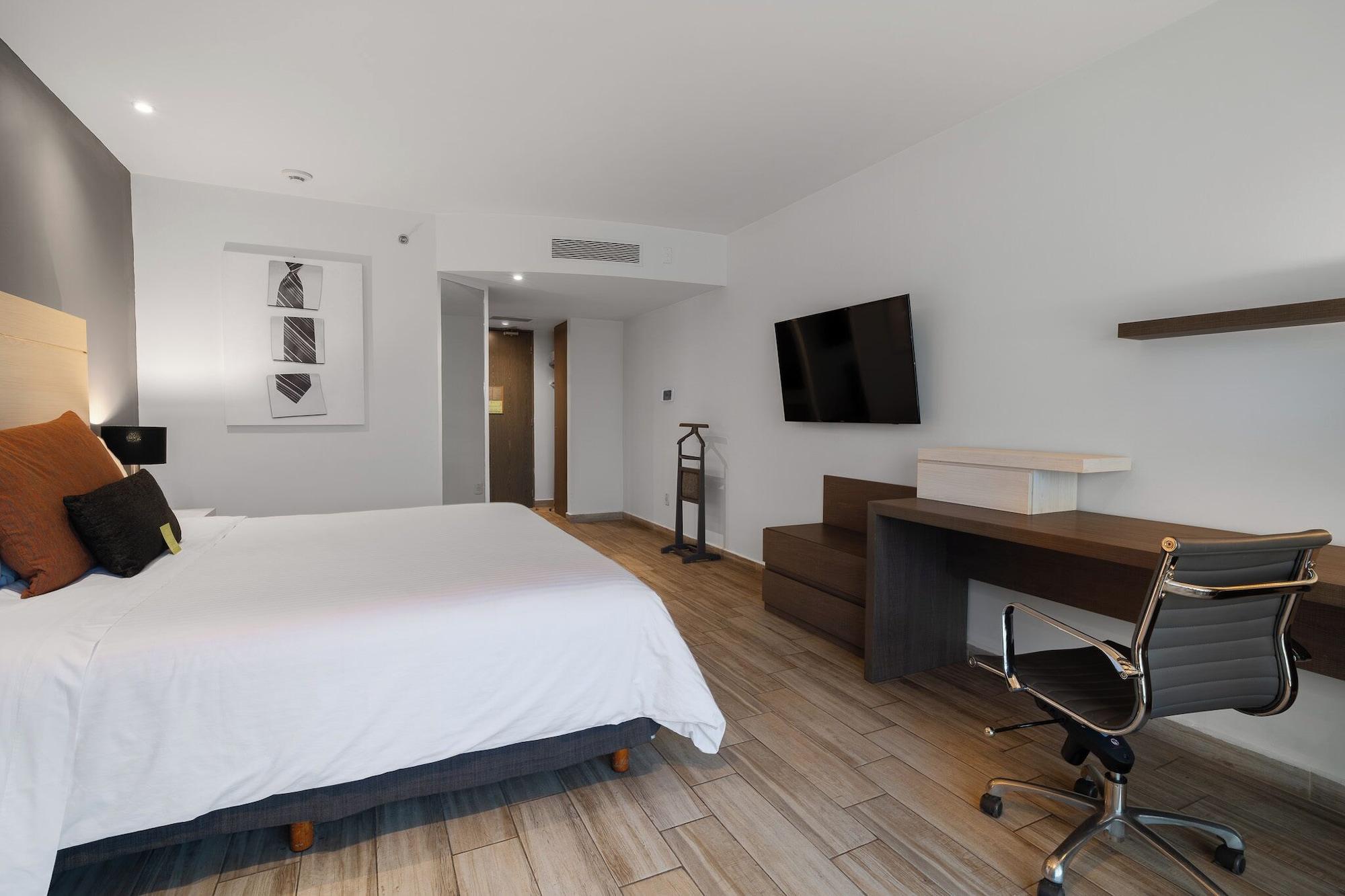 Habitación Real Inn Perinorte