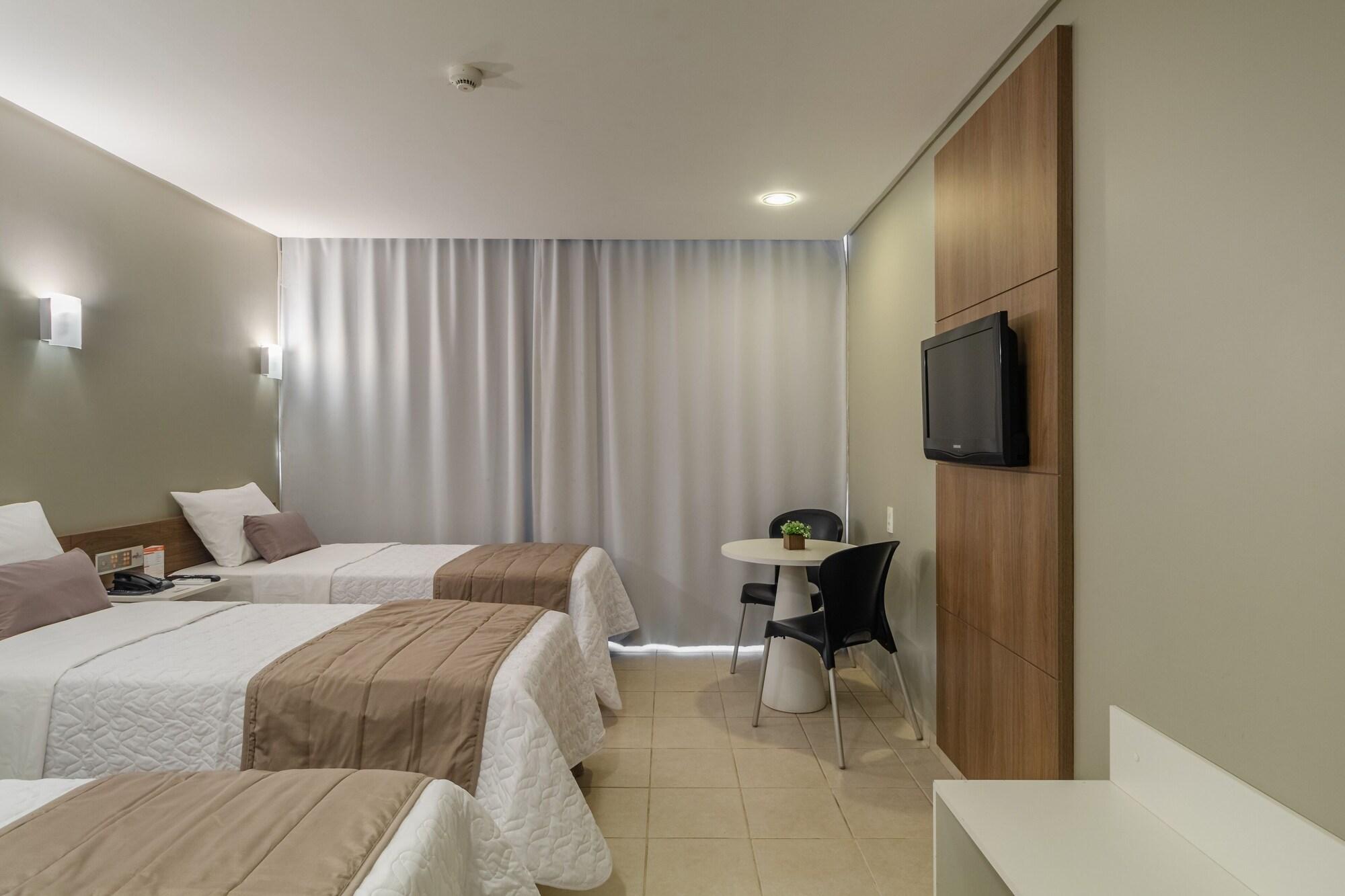 Quarto Citi Hotel Residence