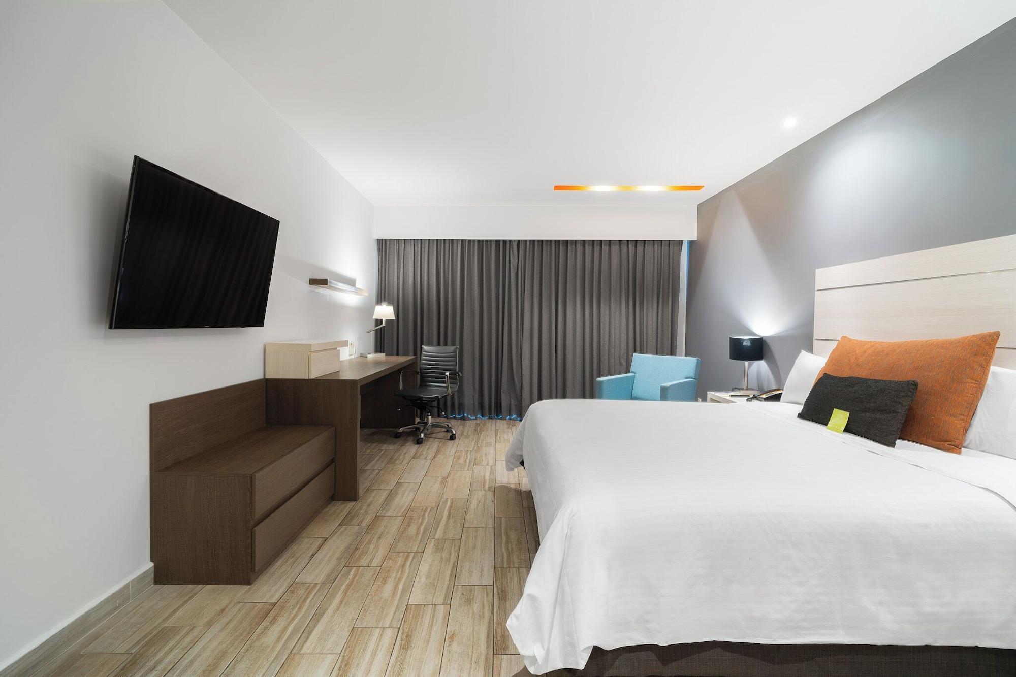 Habitación Real Inn Perinorte