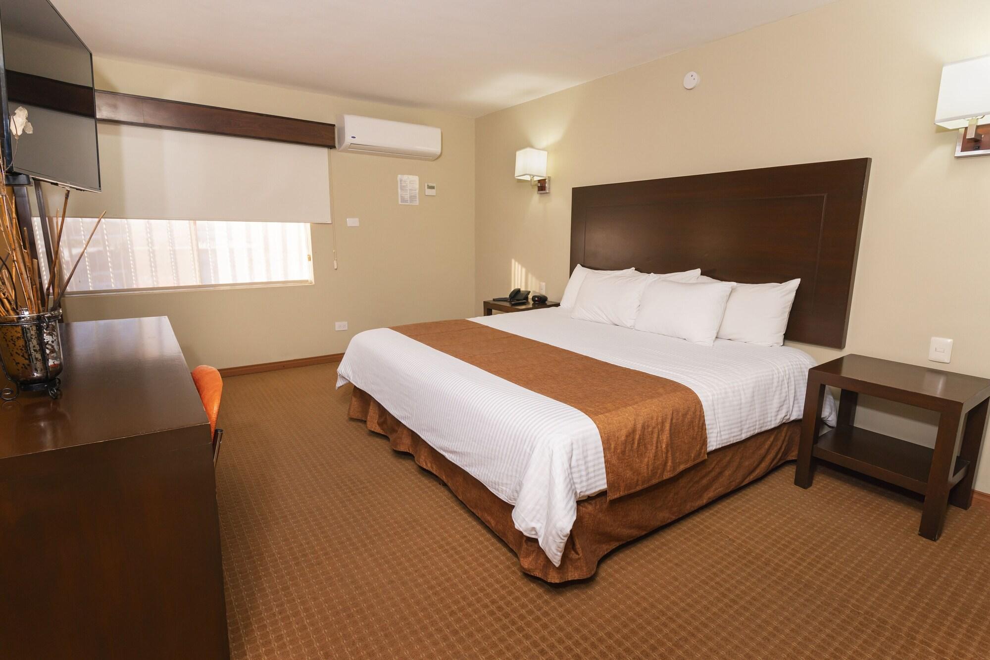 Habitación El Camino Hotel & Suites
