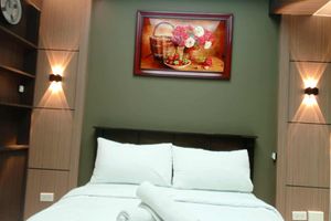 Renta Vacacional - Grand Riviera Suites Manila Condo Infront of us Embassy