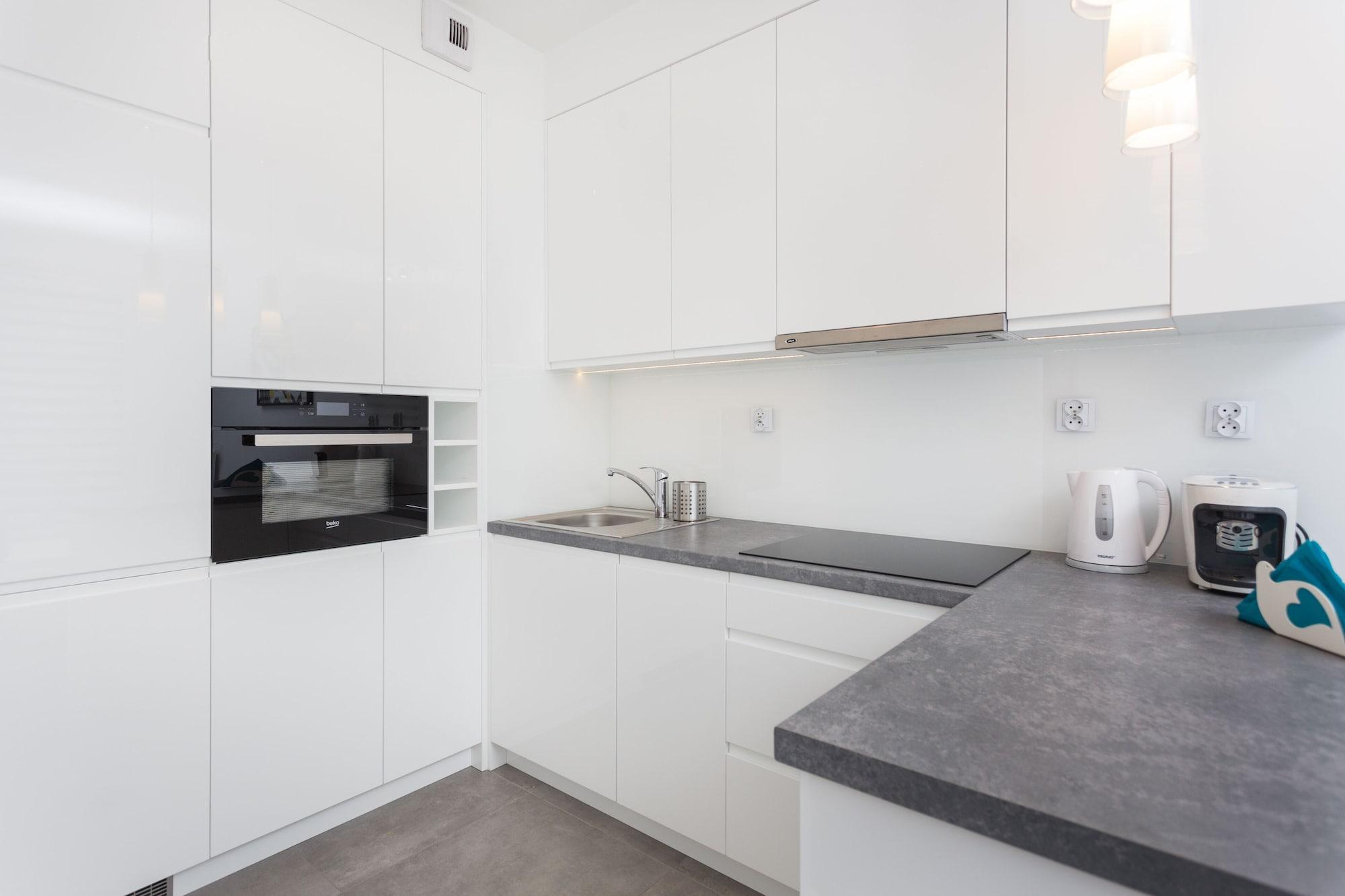 Equipamiento de Habitación InPoint Tauron Arena Apartment