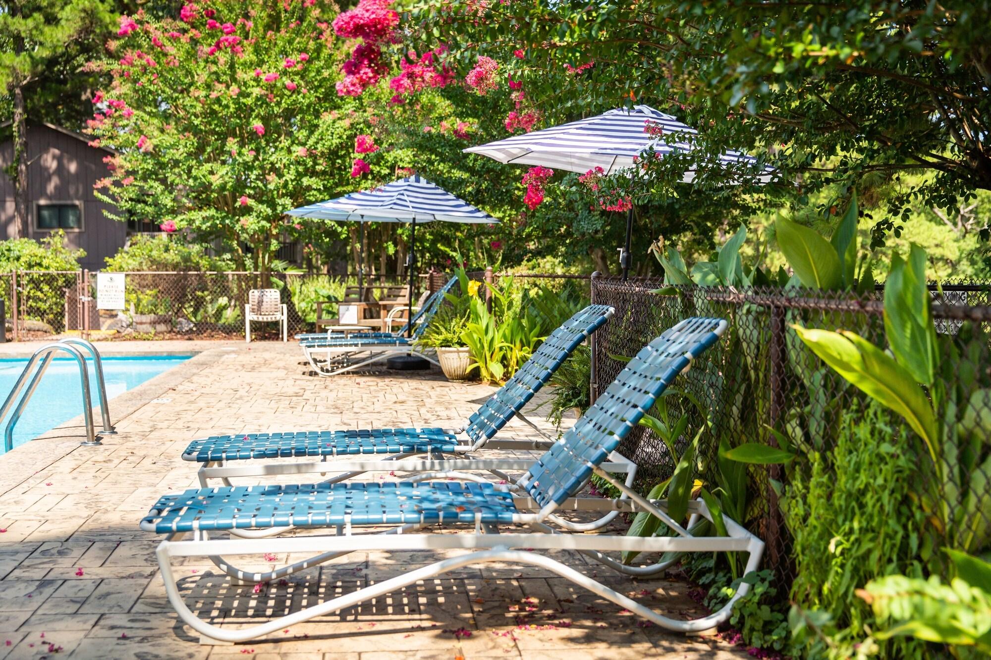 Vista Piscina Poolside King Cabana with full kitchen, king bed, sleeper sofa and pool access. by RedAwning