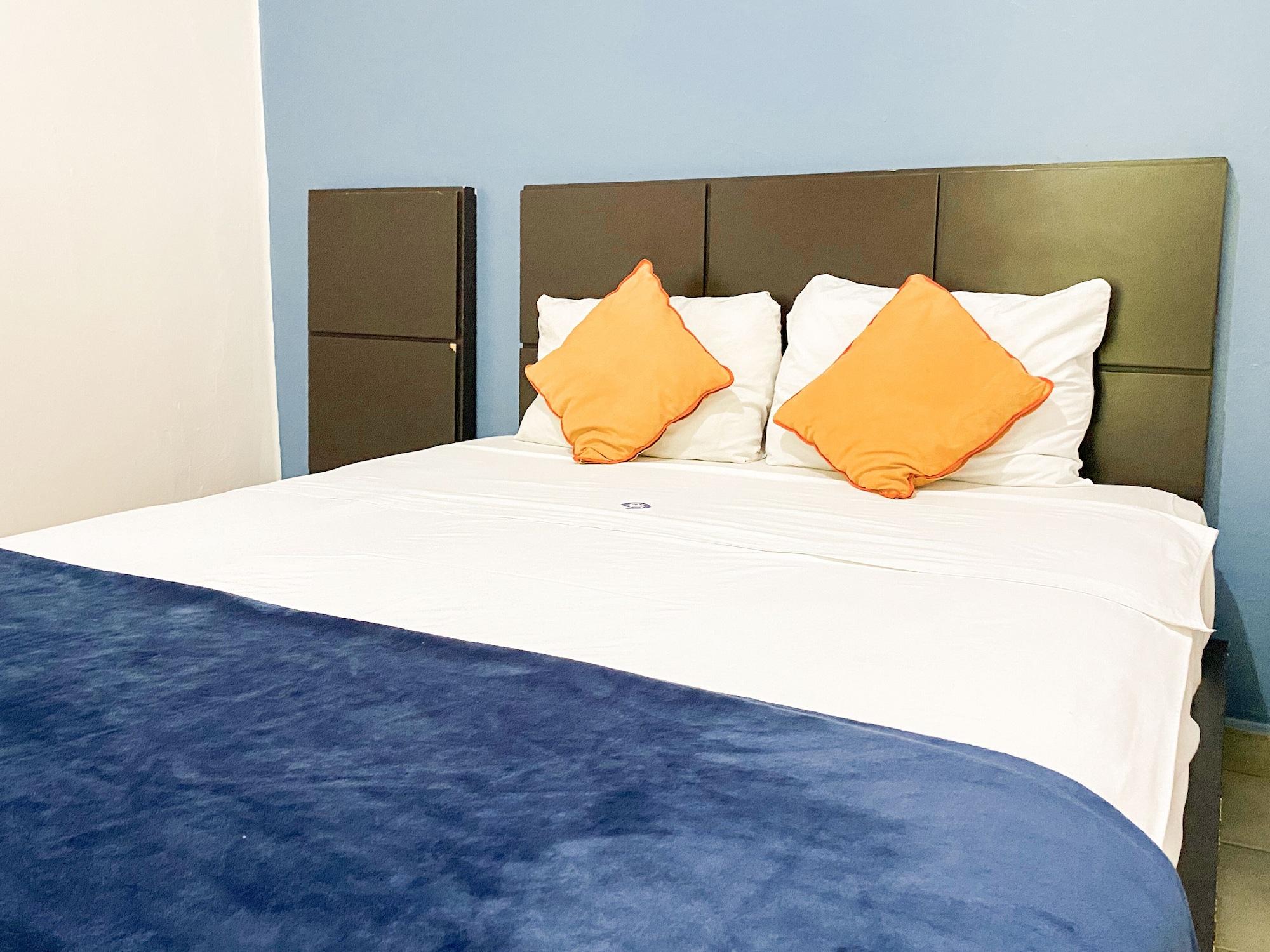 Habitación Hotel Amigo Suites