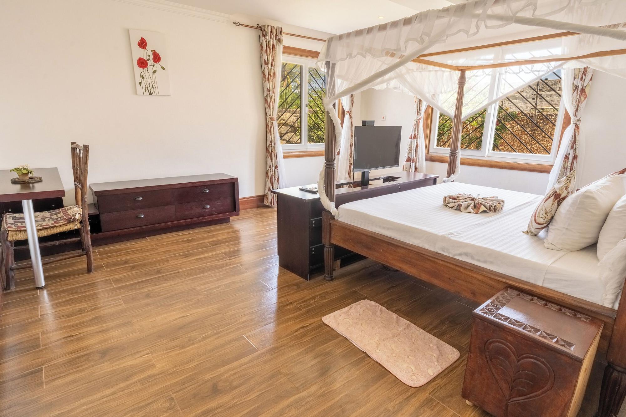 Habitación Queens Chateau Boutique Villa