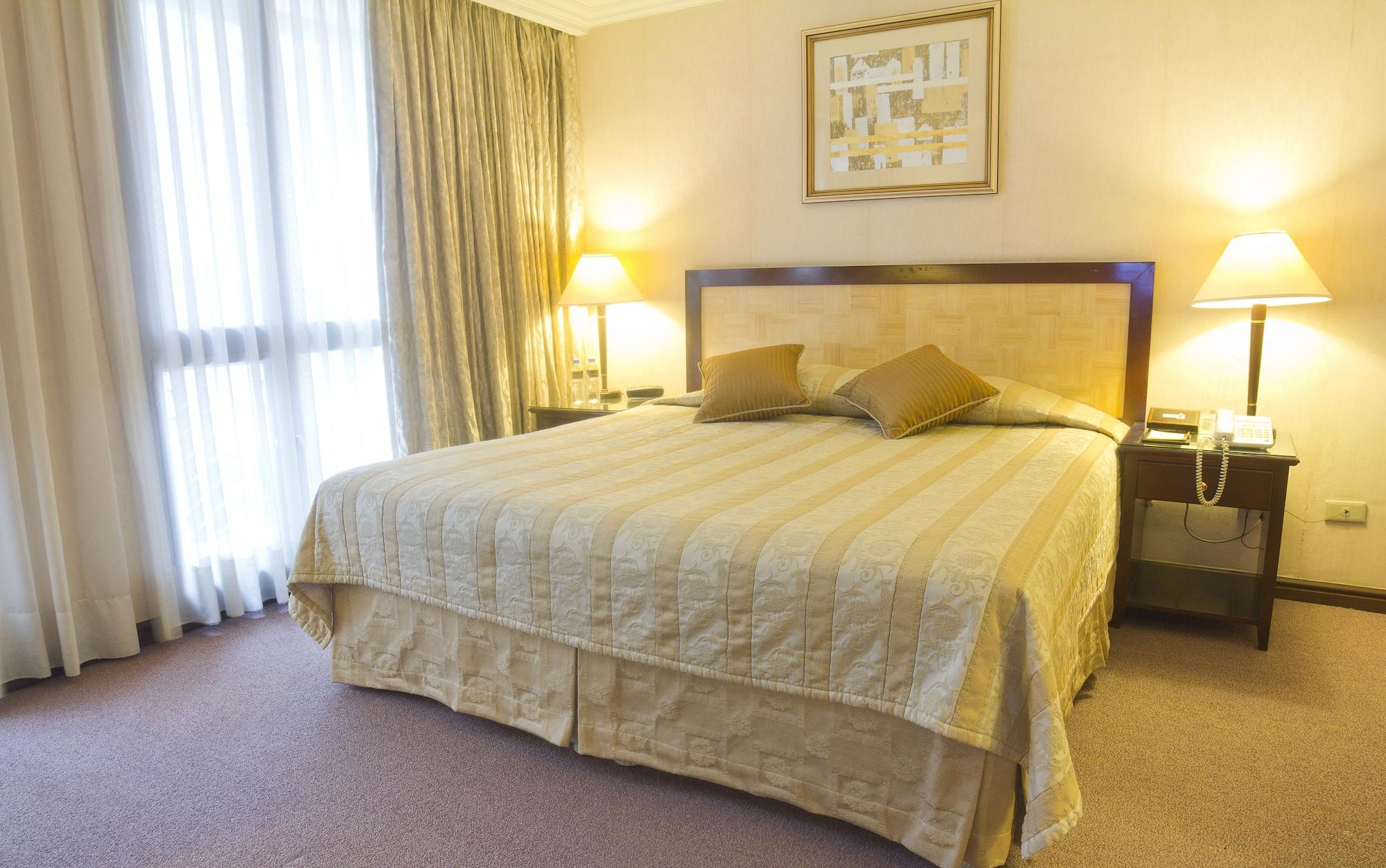 Habitación Herald Suites Solana