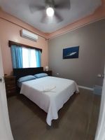 Alquiler Vacacional - Cozy 2-bedroom hotel in amazing Tela with AC, WiFi