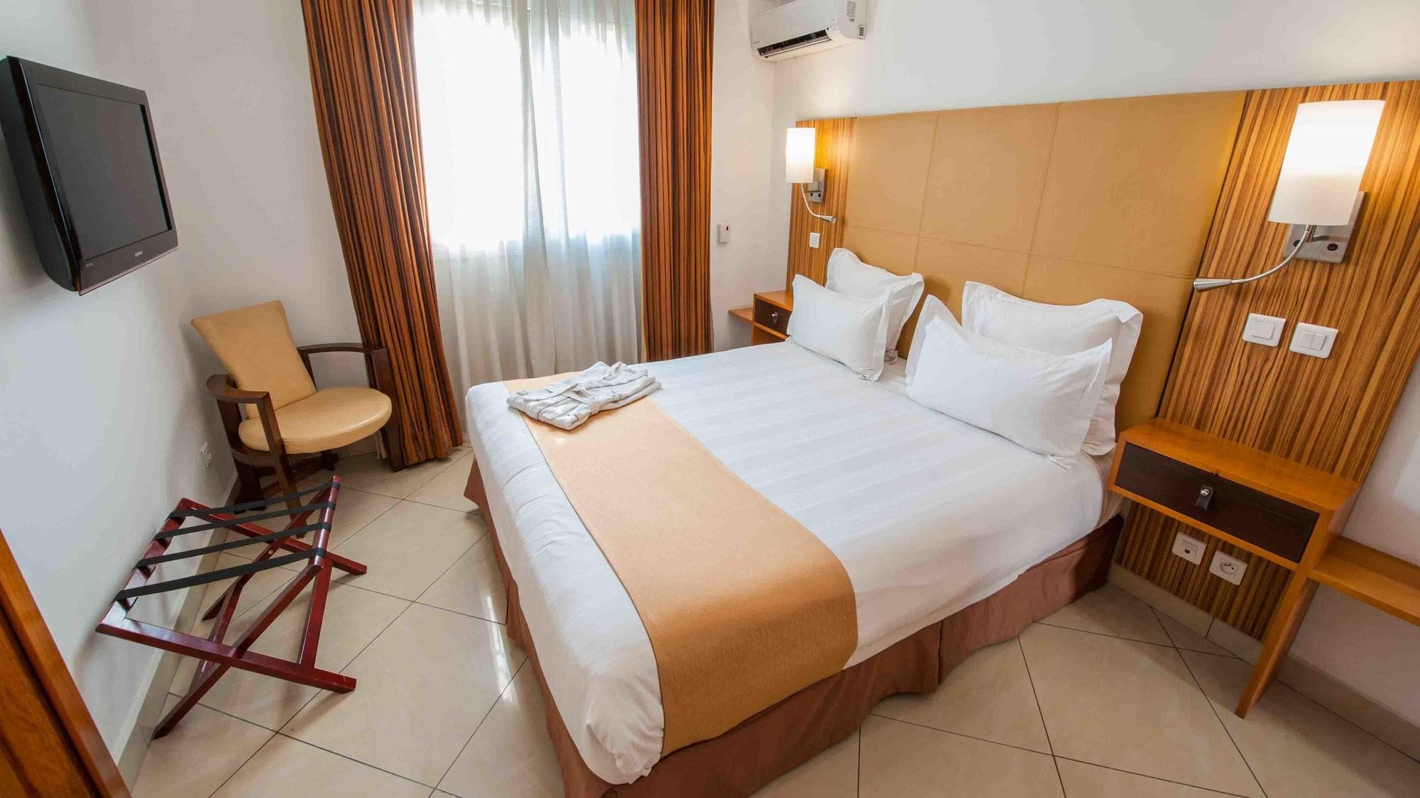 Habitación Nomad Suites Residence