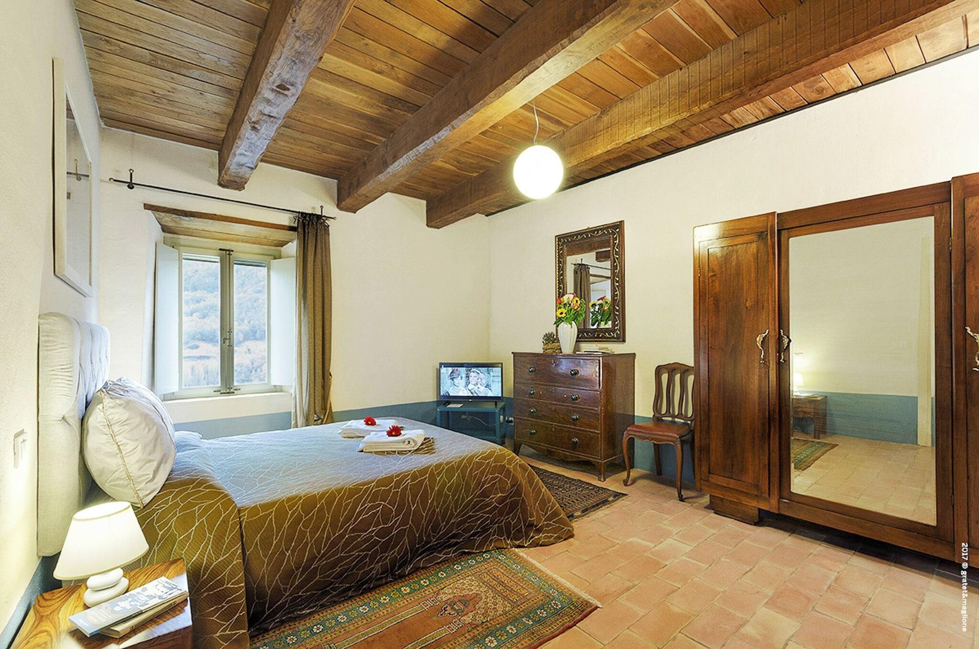 Habitación Castello di Postignano Relais