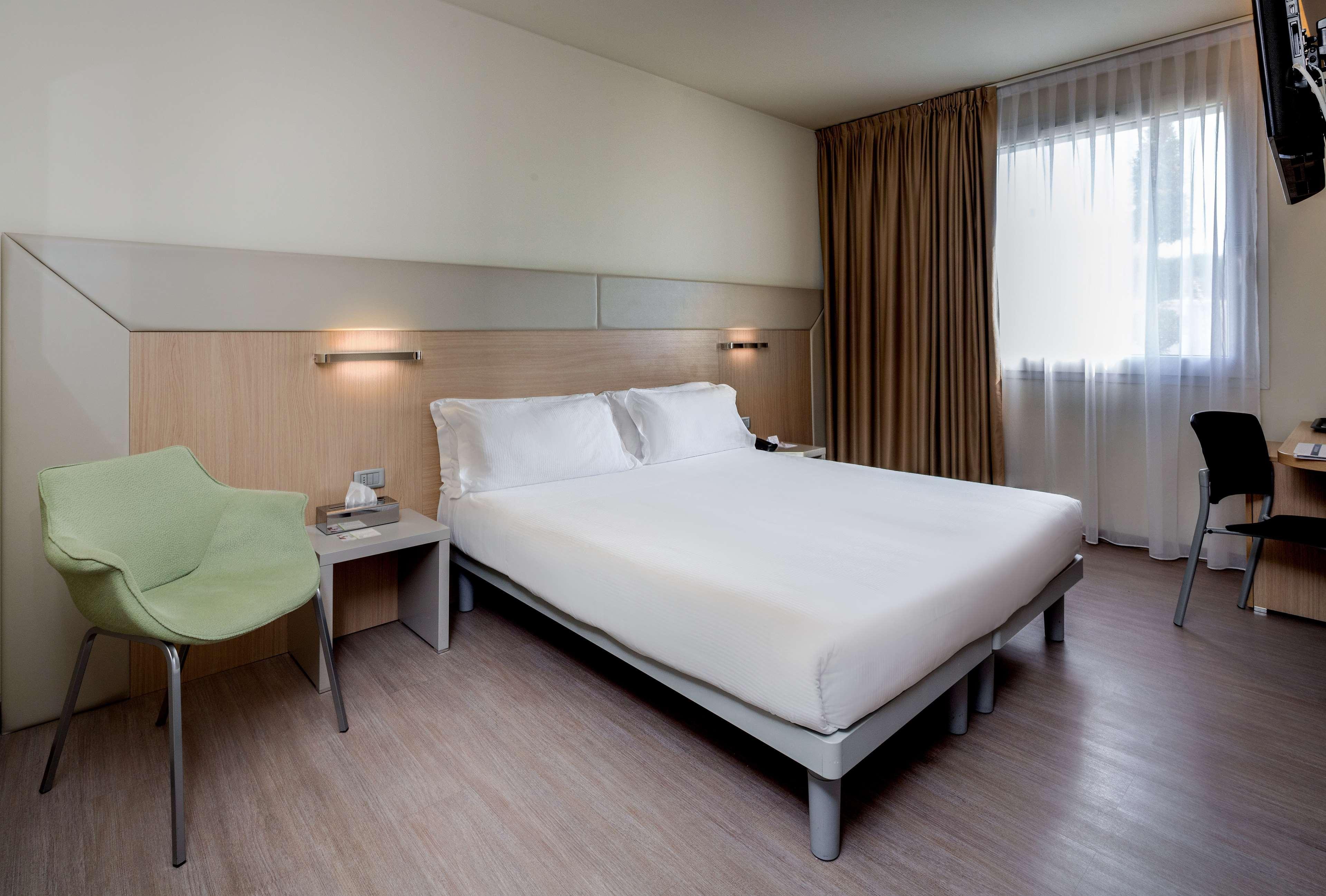 Habitación The Aries Hotel