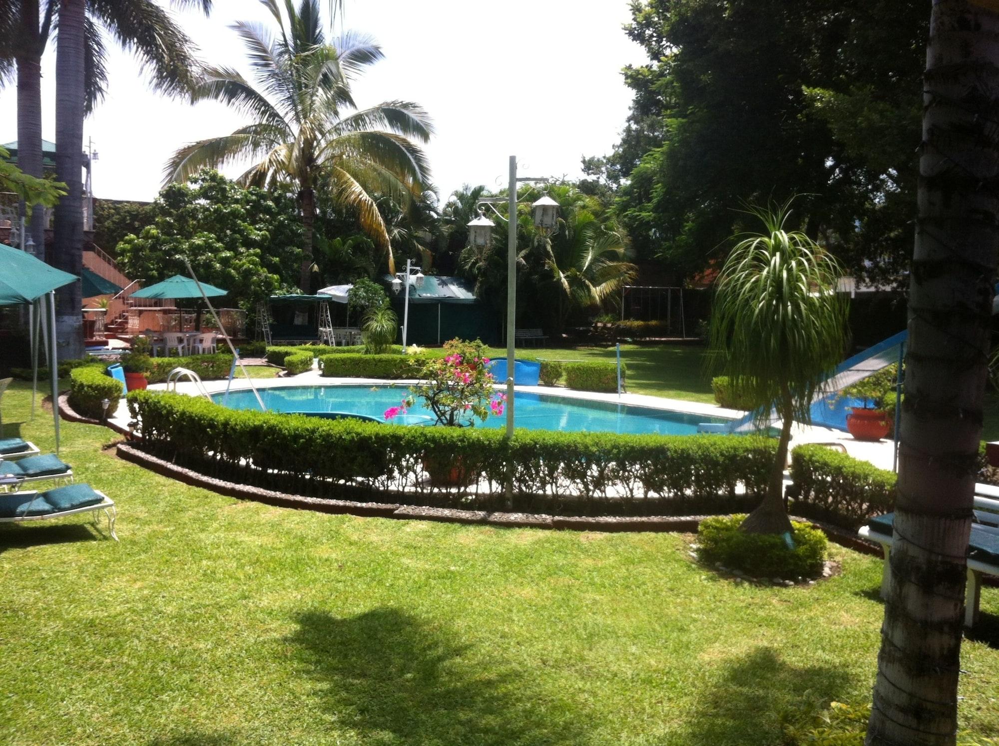Vista Piscina Villa Paraiso