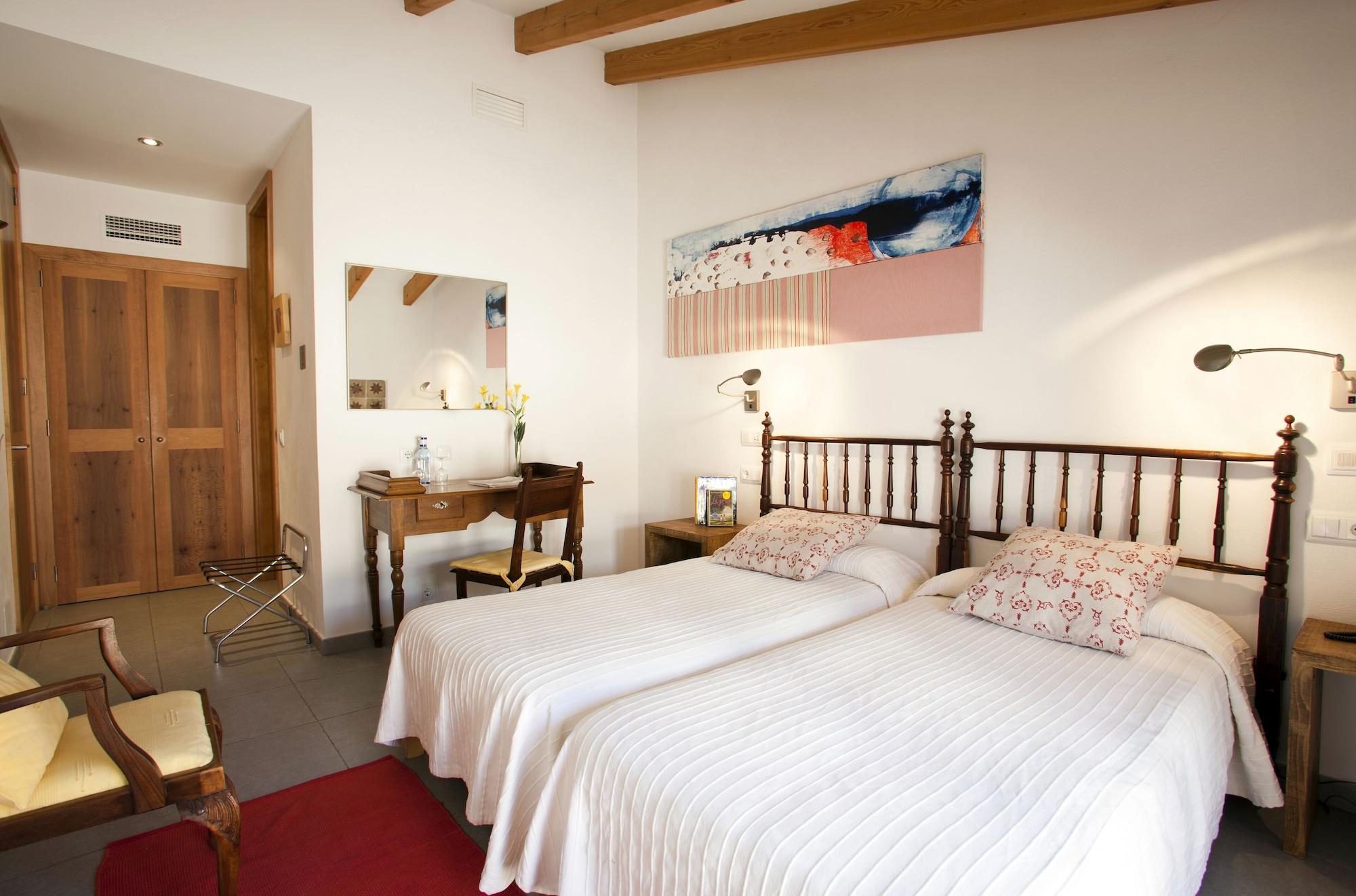 Habitación L'Hostal hotel d'interior