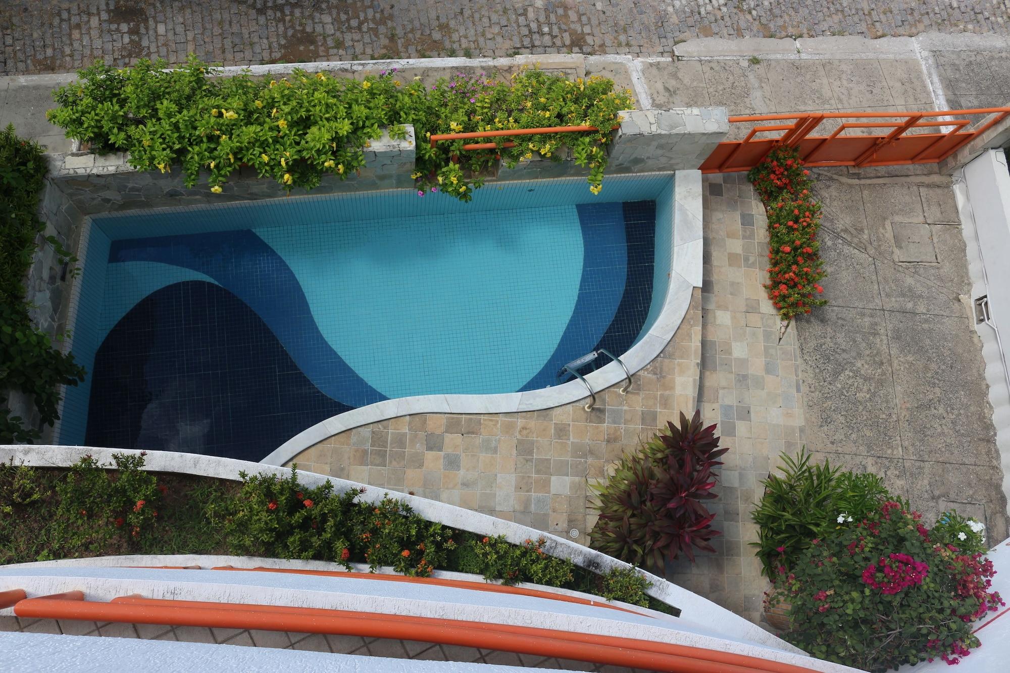 Vista da piscina Marambaia Apart Hotel