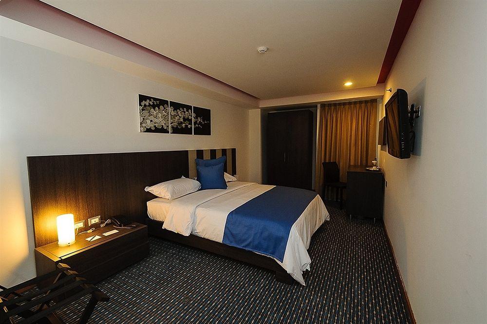 Habitación Hotel Alex