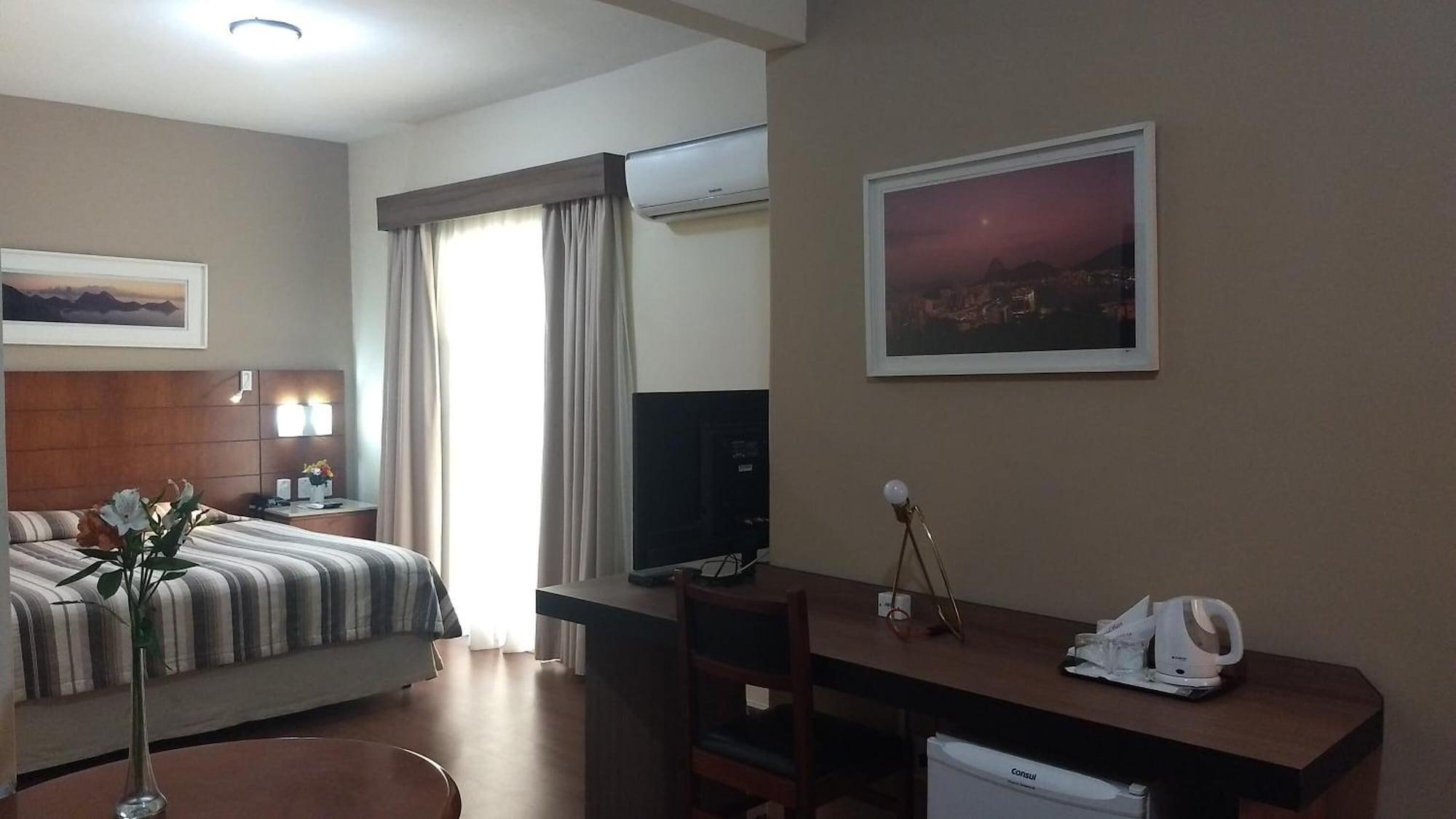 Quarto Castel Plaza Hotel