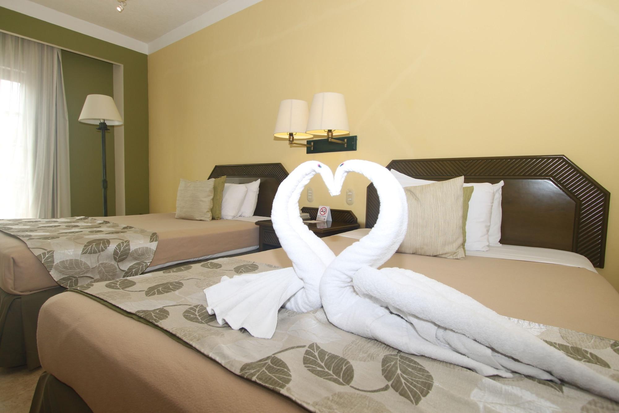 Habitación Hotel Los Itzaes by 5th av