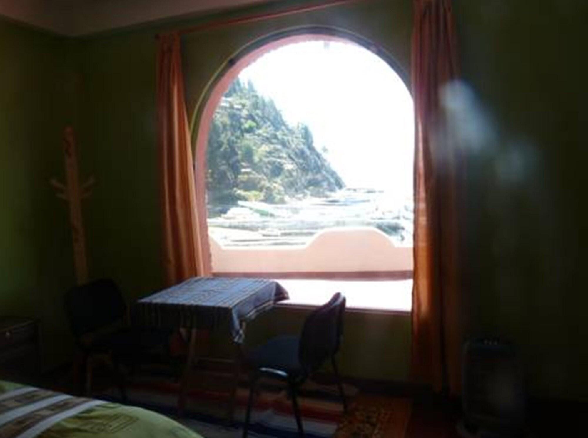 Habitación Hostal Puerto Yumani