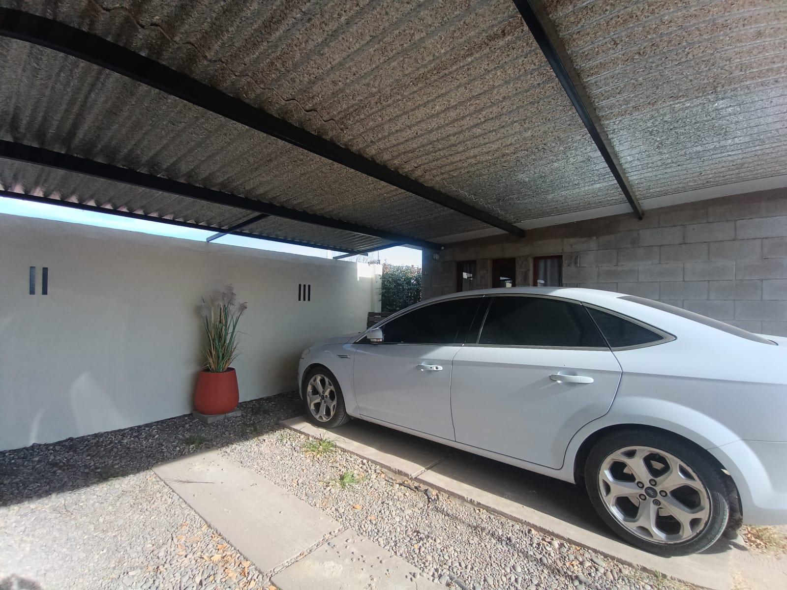 Estacionamiento Nelumbo Petit Chalet