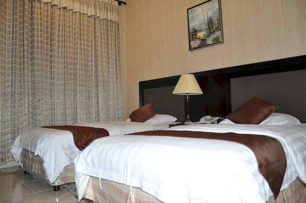 Habitación Pan Gulf Hotel Suites