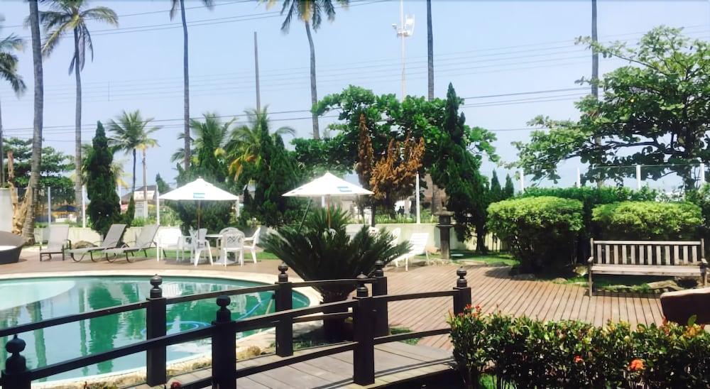 Vista da piscina Charme Hotel Guarujá