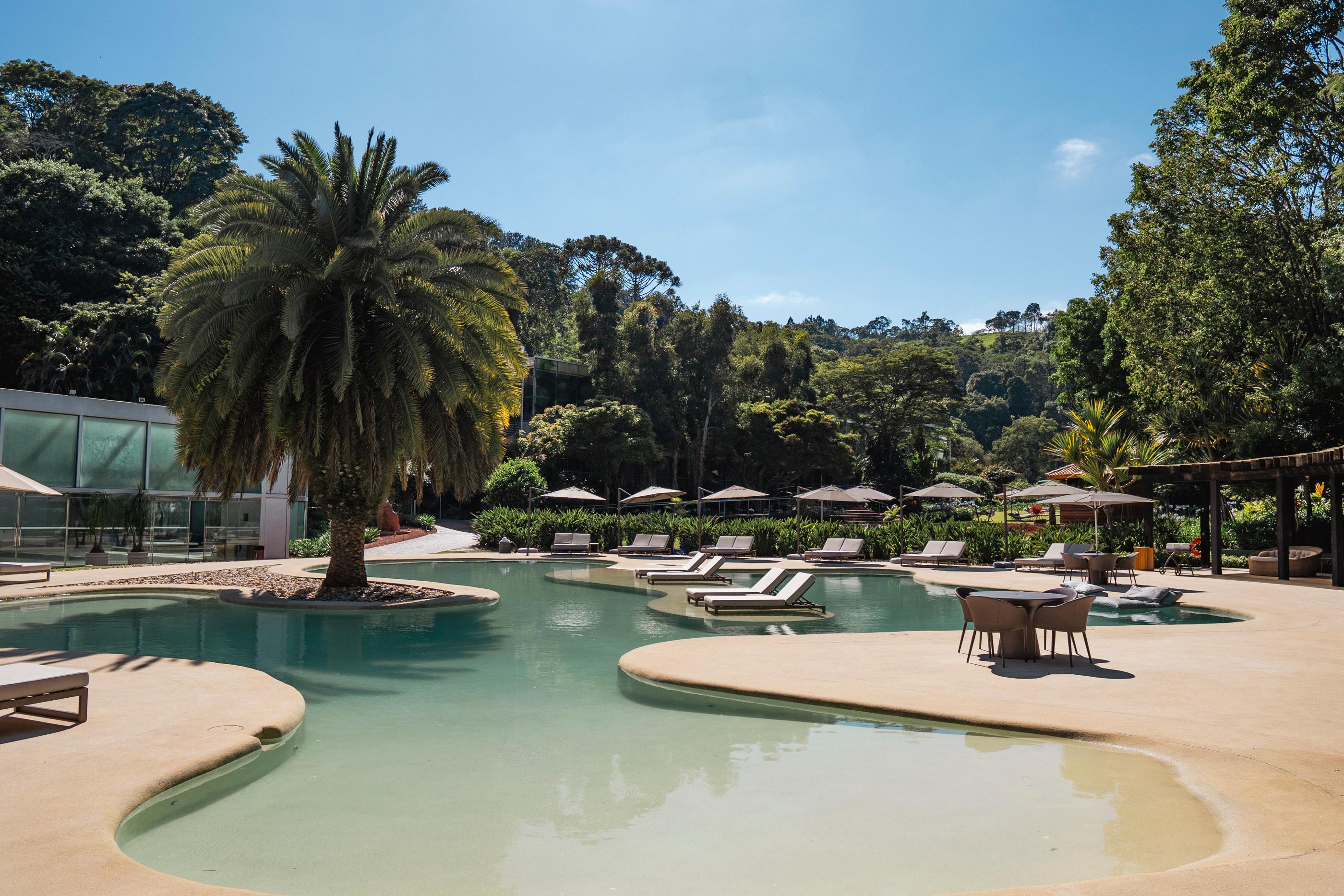 Vista Piscina Hotel Unique Garden
